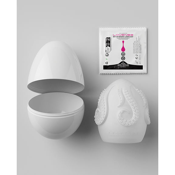 Everything included with the Lovense Kraken Egg including the plastic packaging, the TPE stroker itself, and a sample-sized packet of lube | Kinkly Shop