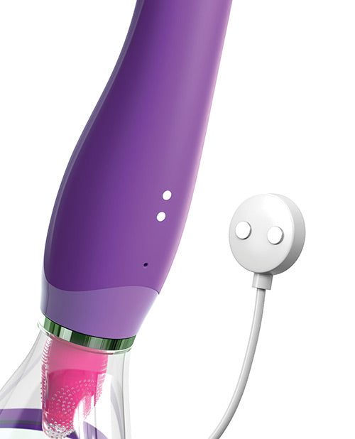 Close-up of the two magnetic prongs that function as the charging port. The magnetic charger probe is shown next to toy, showcasing where the charger attaches on the toy to charge it. | Kinkly Shop
