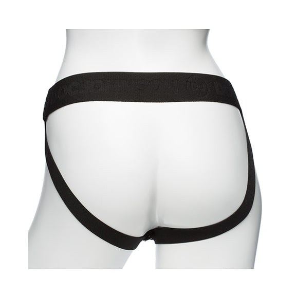Backside of the Be Naughty Vibrating 4 Piece Strap On Set, worn on a mannequin. The strap-on harness has a waist/hip strap as well as two straps that run underneath each of the butt cheeks. | Kinkly Shop