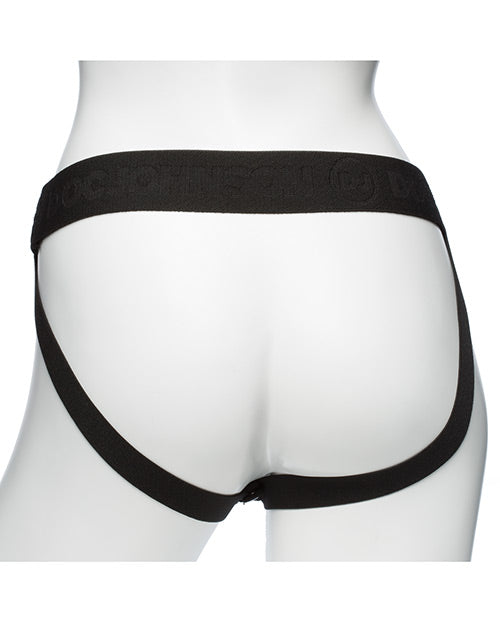 Backside of the Be Naughty Vibrating 4 Piece Strap On Set, worn on a mannequin. The strap-on harness has a waist/hip strap as well as two straps that run underneath each of the butt cheeks. | Kinkly Shop