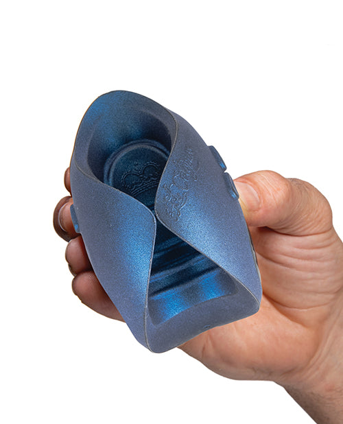 A hand holds the Hot Octopuss Pulse Solo Essential - Limited Edition towards the camera. The color of the silicone is a blue shimmery one. | Kinkly Shop