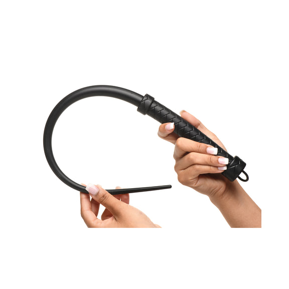 Two hands hold the Master Series Silicone Viper Tail, showcasing the very flexible design that allows the viper tail to fold in back on itself. | Kinkly Shop