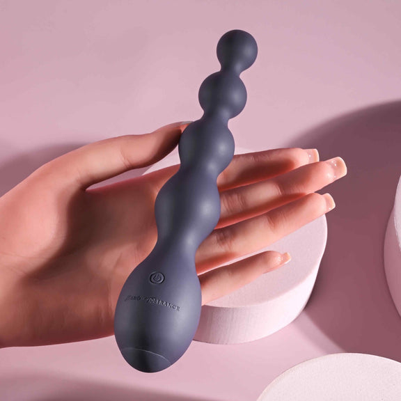 A mannequin has the Zero Tolerance Rumpy Bumpy on its outstretched palm. The vibrator is longer than the palm and looks thin. | Kinkly Shop