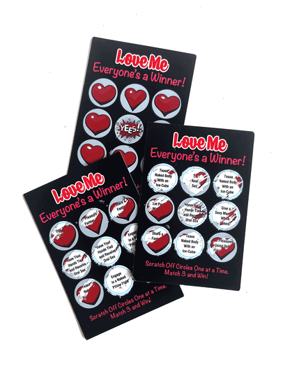 Kinky Lotto Tickets shown with some of the prompts scratched off, showcasing some of the ideas underneath the scratch-off designs. | Kinkly Shop