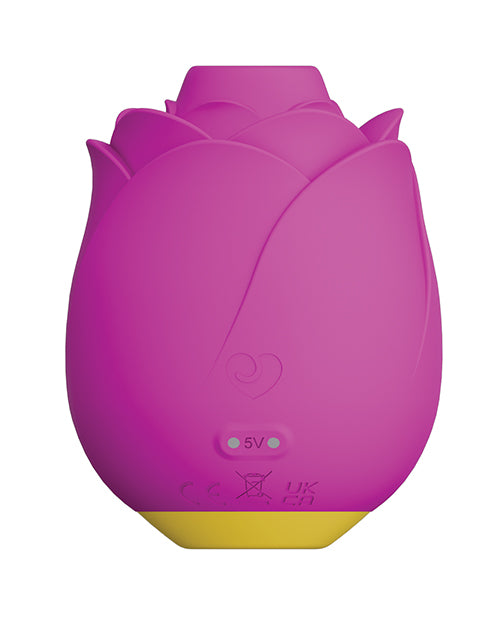 Backside of the ROMP Rose. There are two magnetic charging prongs near the bottom of the vibrator where the magnetic charger attaches to the toy. | Kinkly Shop