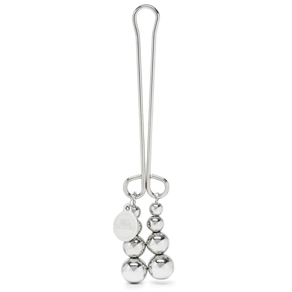 Fifty Shades "Just Sensation" Clitoral Clamp in front of a plain white background | Kinkly Shop