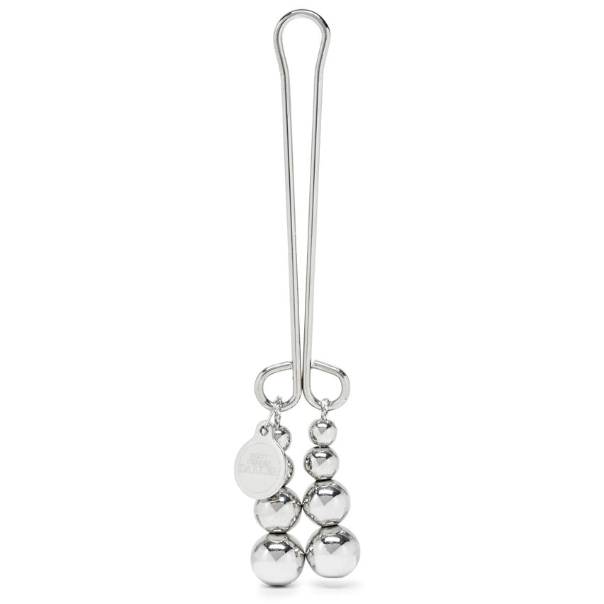 Fifty Shades "Just Sensation" Clitoral Clamp in front of a plain white background | Kinkly Shop
