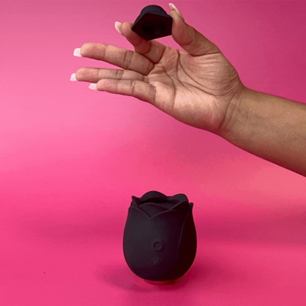 GIF shows a person removing the removable air suction tip from the top of the Hearts & Flowers Rose, making it easier to clean after you're done using it. | Kinkly Shop