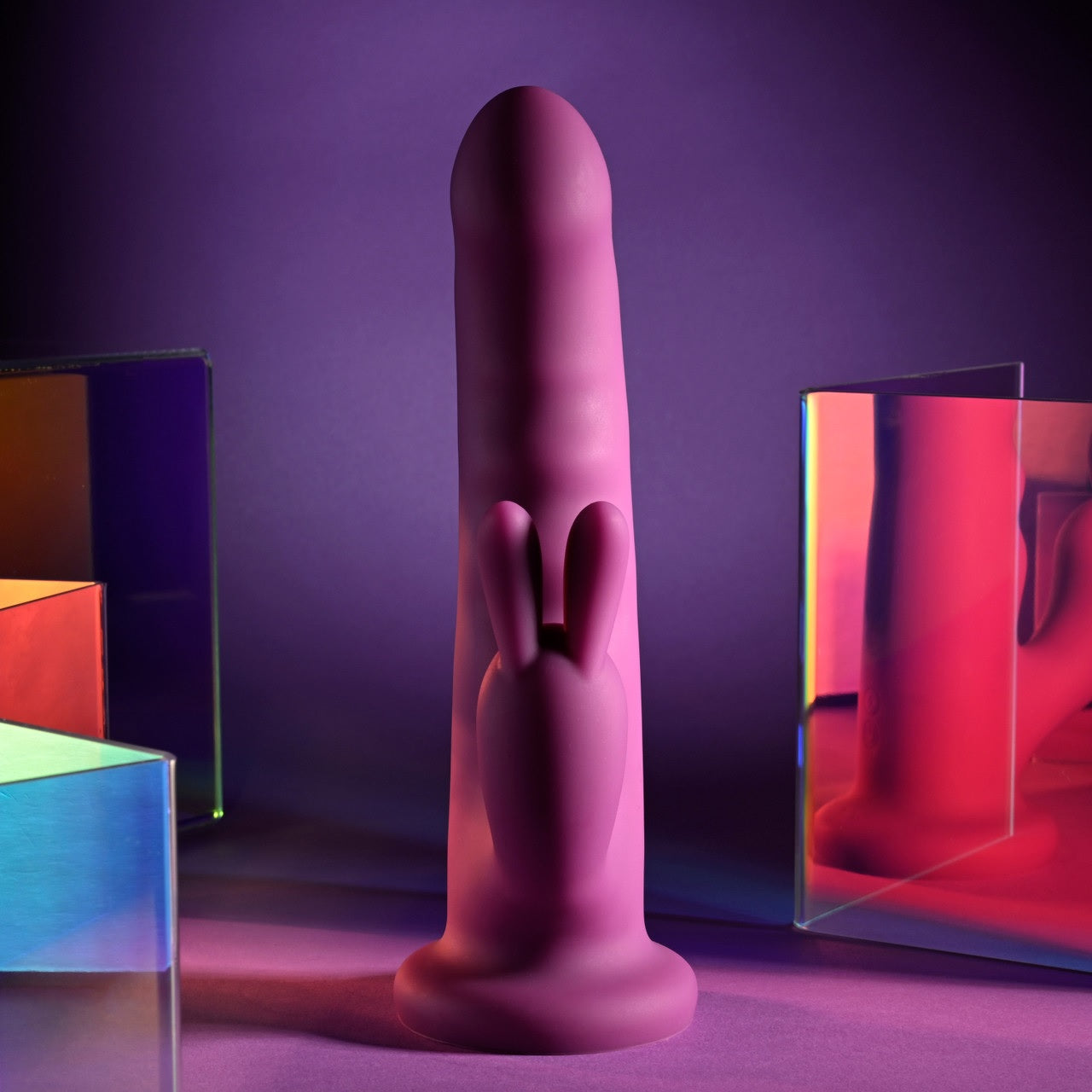 The bunny ears of the clitoral arm of the Playboy Fluffle face the camera. They look wide and playful. | Kinkly Shop