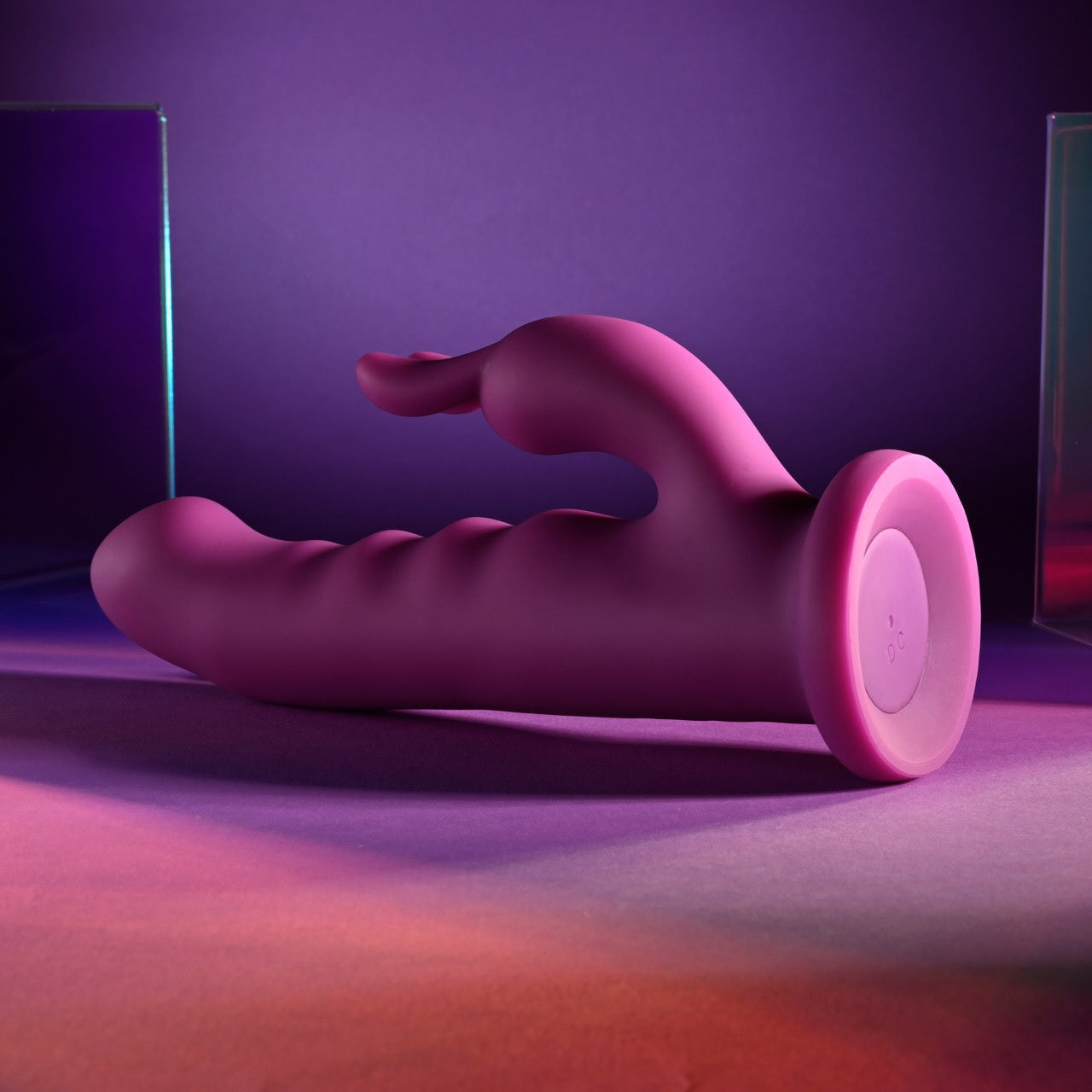 The Playboy Fluffle laying on its side. It appears to have a suction-cup-style base. | kinkly Shop