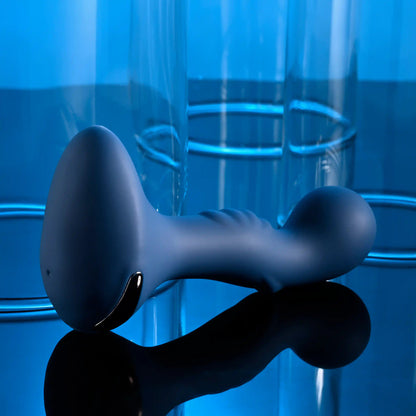 The Zero Tolerance Blue Oasis shown resting on its side, showcasing the thick, round base that makes it anal safe. | Kinkly Shop