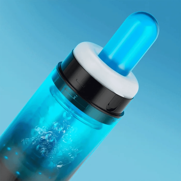GIF showcases a glass probe slid inside of the Adrian Rotator as the rotating cup swirls around the tip of the stroker. | Kinkly Shop