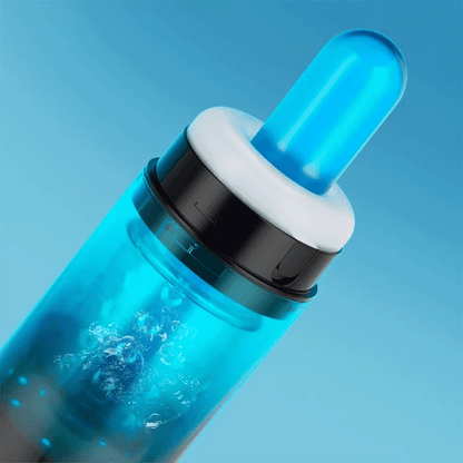 GIF showcases a glass probe slid inside of the Adrian Rotator as the rotating cup swirls around the tip of the stroker. | Kinkly Shop