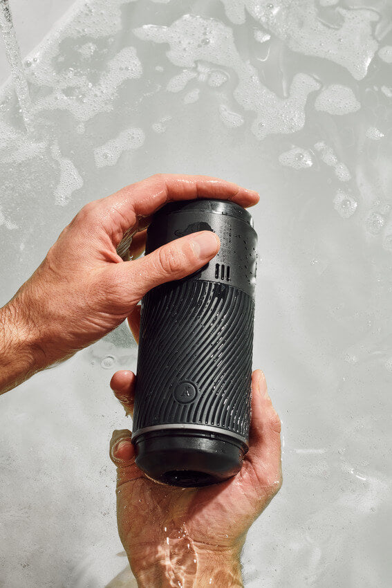 Two hands hold the Arcwave Pow underwater, showcasing the waterproof capabilities of the stroker. | Kinkly Shop