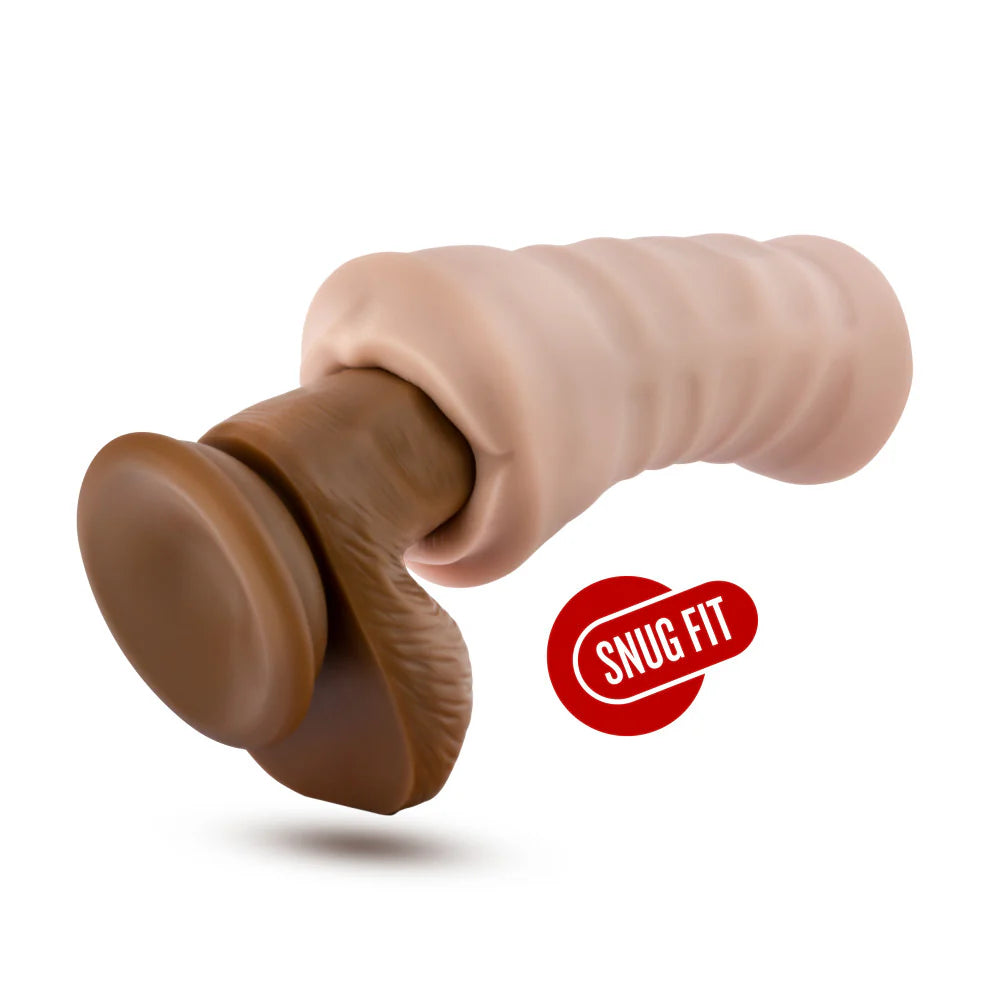 The Angie with Vibrator shown with a realistic dildo slid into its internal canal. The stroker looks very tight. | Kinkly Shop