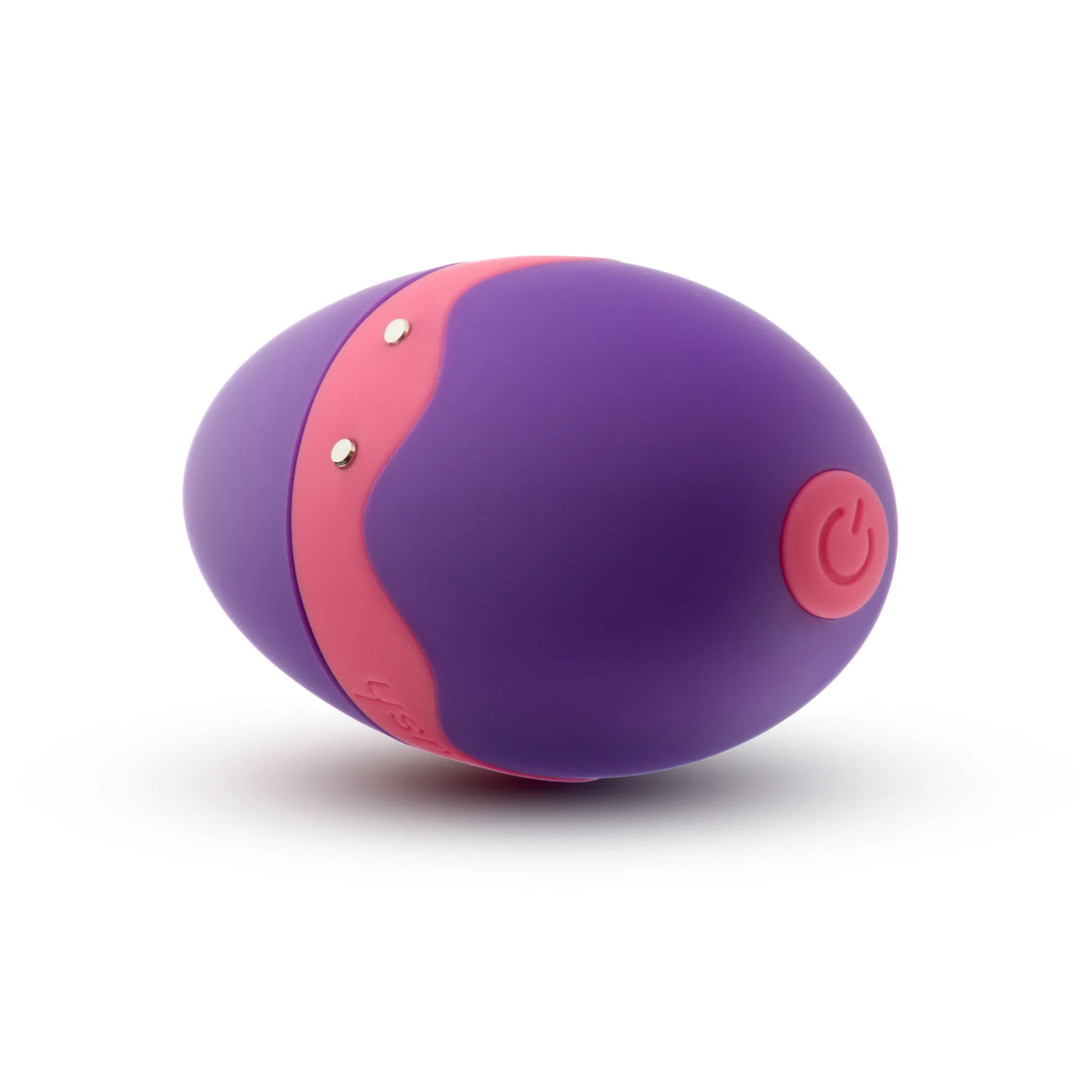 Close-up of the power button on the base of the Blush Aria Flutter Tongue as well as the two magnetic charging prongs on the side of the toy. | Kinkly Shop