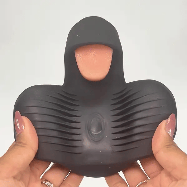 GIF has a person holding out the "taco" stroker "wings" of the toy while the tongue flicks. | Kinkly Shop