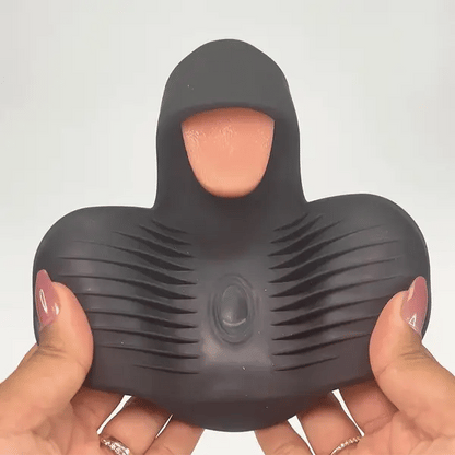 GIF has a person holding out the "taco" stroker "wings" of the toy while the tongue flicks. | Kinkly Shop