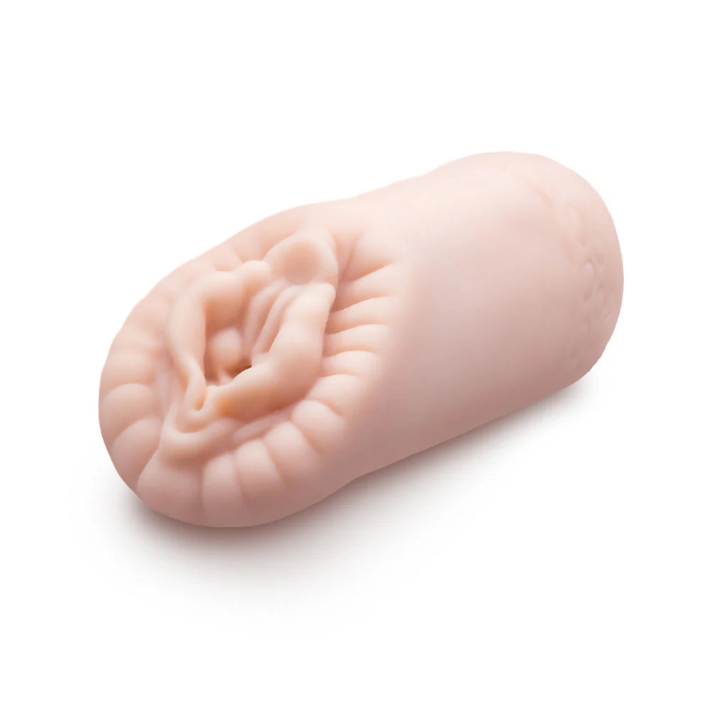 The Blush Sexy Snatch laying on its side against a plain white background | Kinkly Shop