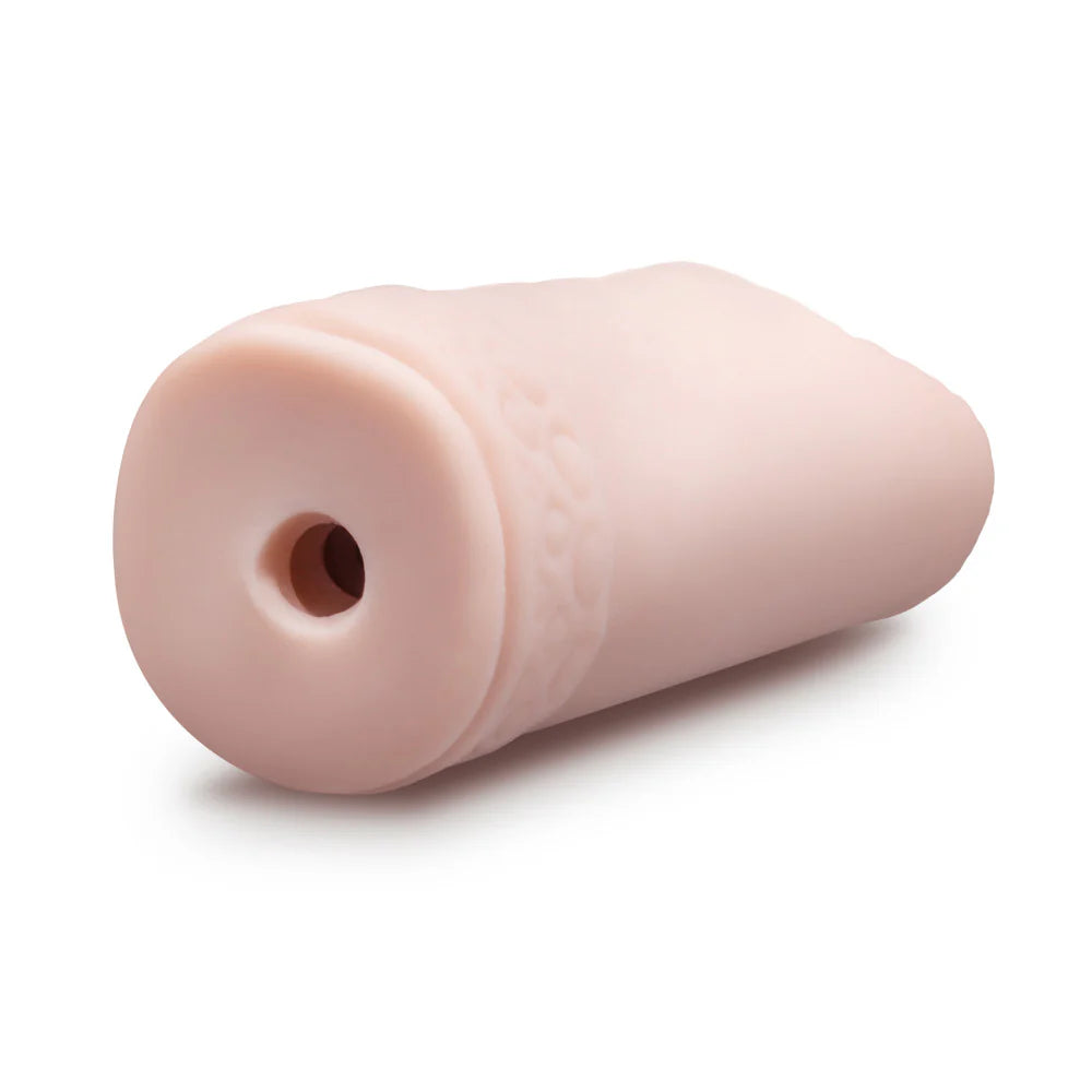 A close-up of the end of the Blush Sexy Snatch. It's an open-ended design, and this side of the stroker is a plain open hole. | Kinkly Shop