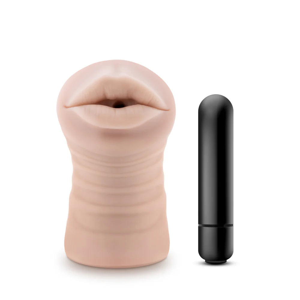 The Blush Skye shown next to a vibrating bullet that can be used with the stroker. | Kinkly