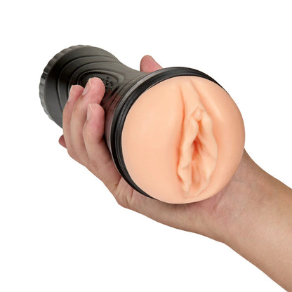 A hand holds the Blush Torch. The stroker seems to fit comfortably in their hand. | Kinkly Shop
