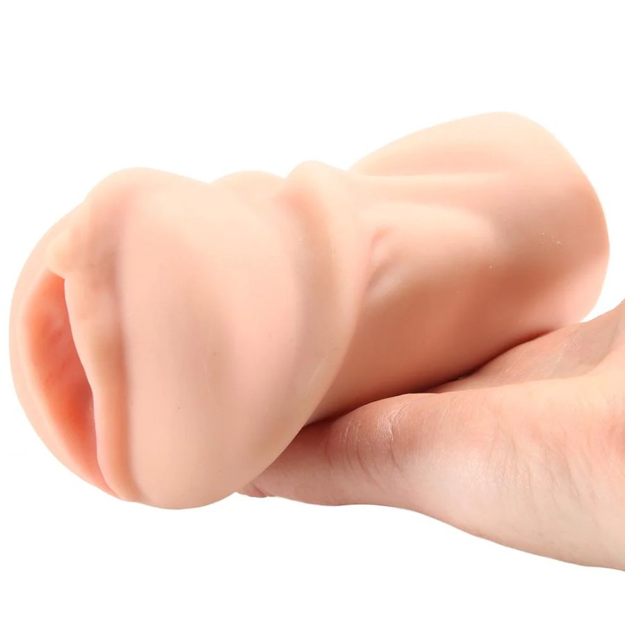 A person's outstretched palm. The Angela White Pussy stroker is resting on it. It looks somewhat small on the person's palm. | Kinkly Shop
