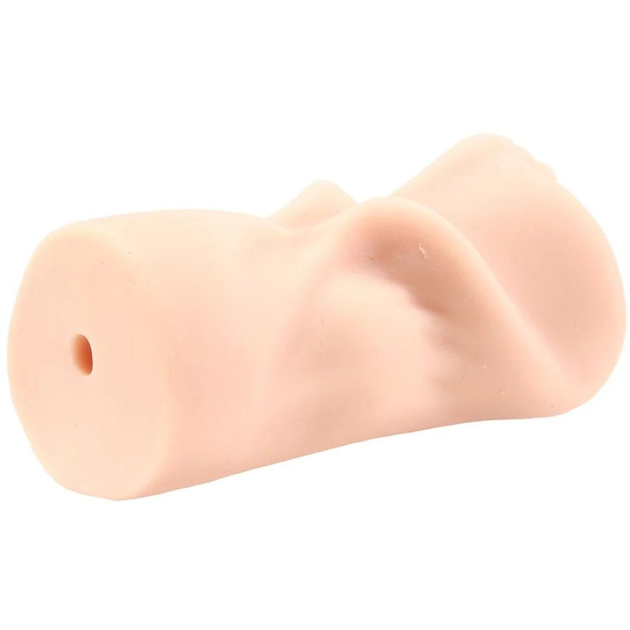 The side opposite the vulva entrance. There's an open hole to allow water to drain through the Angela White Pussy stroker | Kinkly Shop