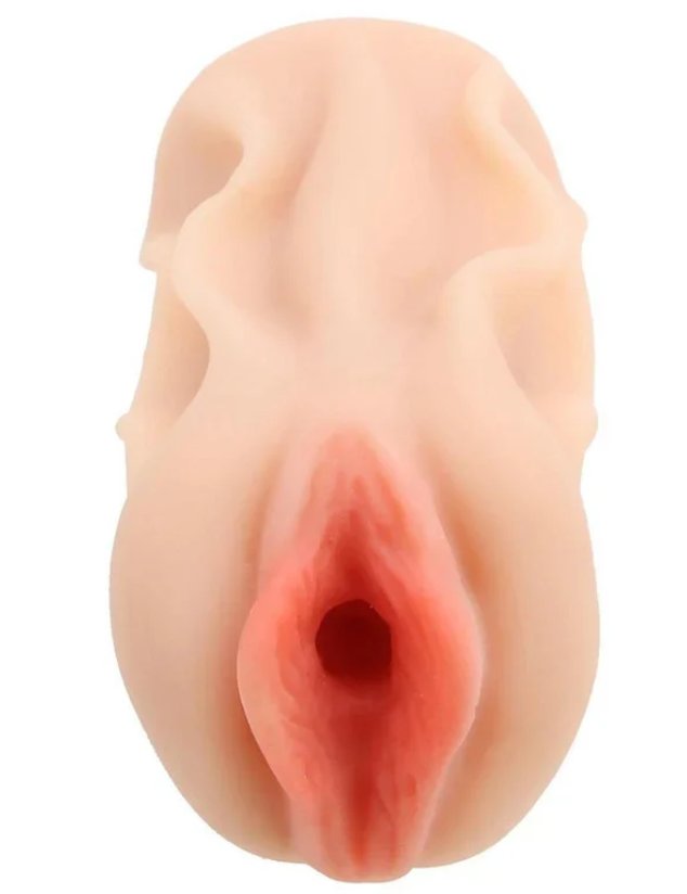 Close-up of the entrance and orifice of the Elsa Jean Pussy stroker. The stroker has visible labia. | Kinkly Shop