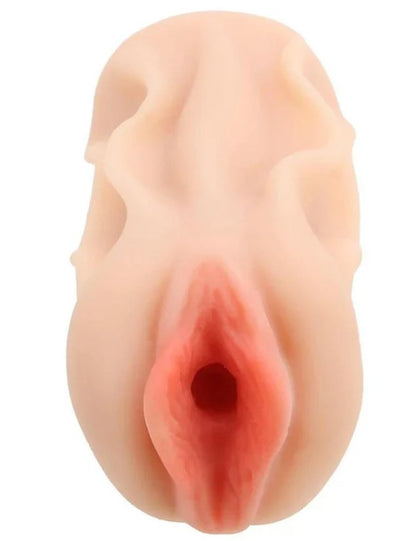 Close-up of the entrance and orifice of the Elsa Jean Pussy stroker. The stroker has visible labia. | Kinkly Shop