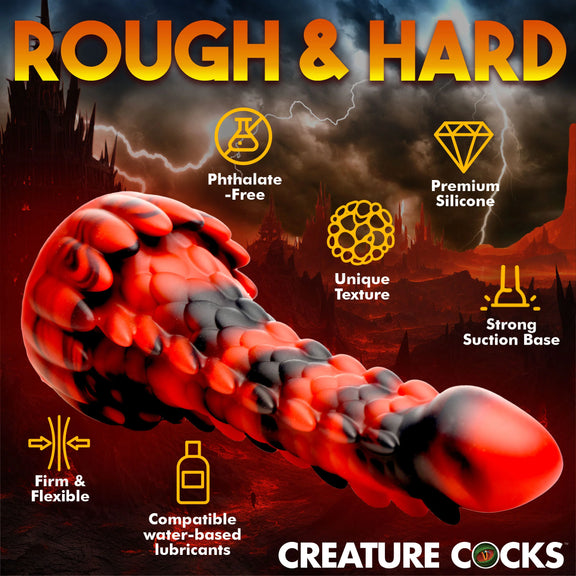 The Creature Cocks Demon Rising shown surrounded by a text and icon list of features. Text reads: Rough & hard. Phthalate-free. Premium silicone. Unique texture. Strong suction base. Firm and flexible. Compatible with water-based lubricants. | Kinkly Shop