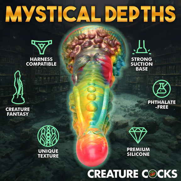 The Creature Cocks Majestic Merman shown next to a list of icons and text. Text on the image includes: Harness compatible. Creature fantasy. Unique texture. Strong suction base. Phthalate-free. Premium silicone. | Kinkly