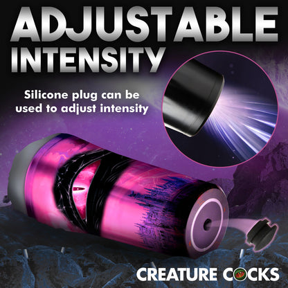 Close-up on the base of the Creature Cocks Predator Stroker showcases the silicone plug. This plug can be put in or removed to adjust how much suction the stroker offers. Text reads: Adjustable intensity. Silicone plug can be used to adjust intensity. | Kinkly Shop