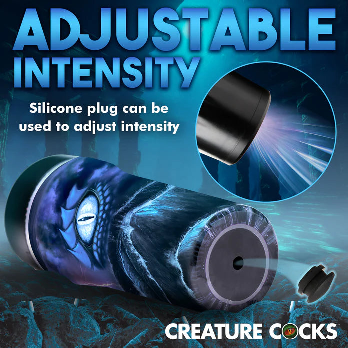 Close-up of the plugged hole at the base of the Creature Cocks Pussidon. Text on the image reads: Adjustable intensity. Silicone plug can be used to adjust intensity. Simply pop it out! | Kinkly Shop