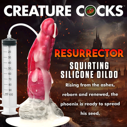 The Creature Cocks Resurrector Phoenix Squirting shown covered in cum lube dripping down its length, showcasing the squirting functionality. Text on the image reads: "Resurrector squirting silicone dildo. Rising from the ashes, reborn and renewed, the phoenix is ready to spread his seed." | Kinkly Shop
