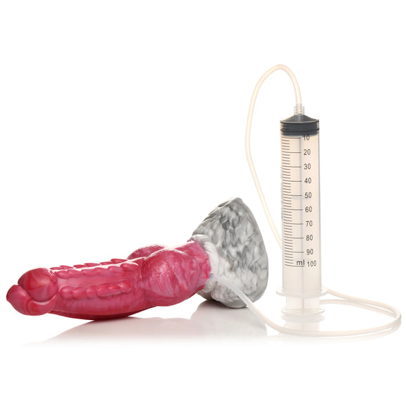 The Creature Cocks Resurrector Phoenix Squirting shown next to the attached tubing and syringe that allows the dildo to ejaculate. | Kinkly Shop