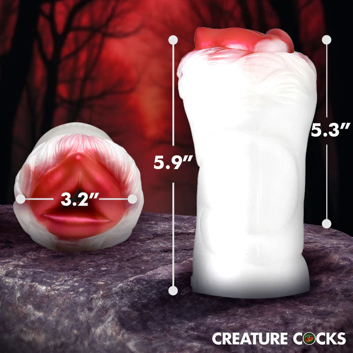 The Creature Cocks Snow She-Wolf Silicone Stroker with measurements shown overtop of it. All measurements are included within the product text description. | Kinkly Shop