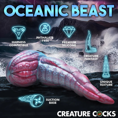 The Creature Cocks Tentacle with text and icons surrounding it to showcase its features. Text includes harness compatible, phthalate free, premium silicone, suction base, creature fantasy, unique texture. | Kinkly Shop