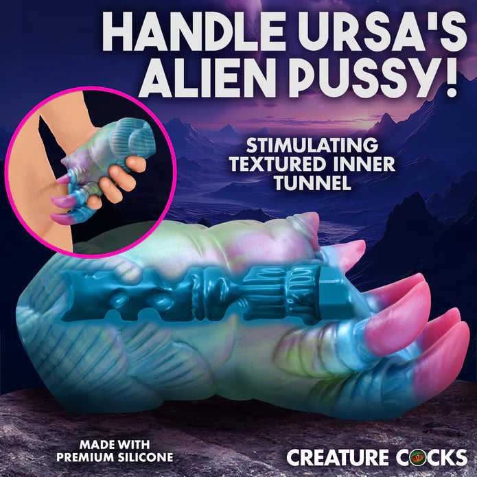 Illustrated penis is slid inside of a Creature Cocks Ursa. The stroker's "claws" are wrapped around the shaft. Text on the image reads: Handle Ursa's alien pussy. Stimulating tetured inner tunnel. Made with premium silicone. | Kinkly Shop