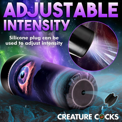 The bottom of the Creature Cocks Wormhole Alien shown pointing towards the camera. The suction plug is shown popped out from the base of the stroker, showcasing how the suction control plug works. Text on the image reads: "Adjustable intensity. Silicone plug can be used to adjust intensity." | Kinkly Shop