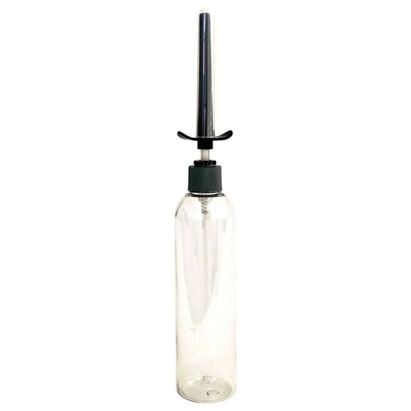 The Demon Kat Spout Lube Shooter screwed onto the top of an empty, clear, see-through bottle to showcase how the lube shooter works. | Kinkly Shop