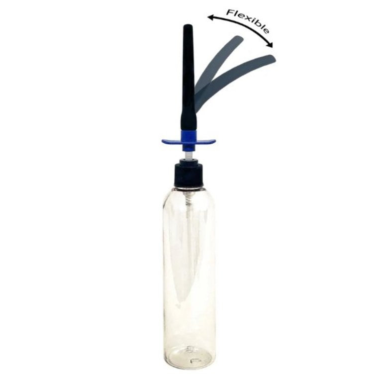 The Demon Kat Spout Lube Shooter on top of a see-through, empty bottle. Multiple images of the tip are superimposed over top of one another, showcasing how flexible the tip of the lube shooter is. | Kinkly Shop