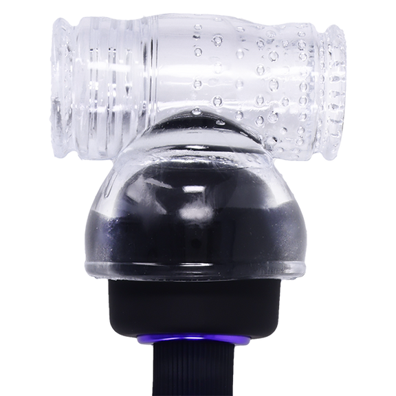 The Merci Cock Stroker Wand Attachment shown on top of the Merci wand massager, adding a stroker to the tip of the wand massager. | Kinkly