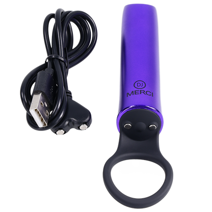 The Merci Power Play shown next to the charging cable that it comes with. | Kinkly