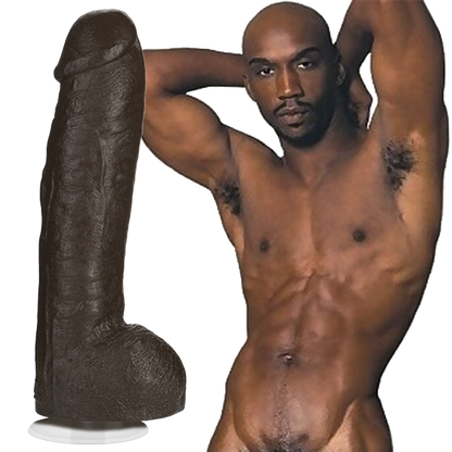 Bam is naked and looking into the camera. The Signature Cocks PVC - Bam dildo is shown next to Bam, a direct replica of the porn star's shaft. | Kinkly Shop