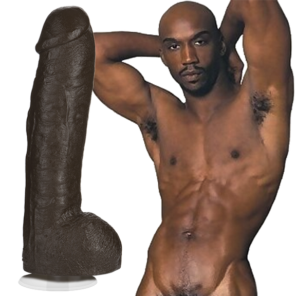 Bam is naked and looking into the camera. The Signature Cocks PVC - Bam dildo is shown next to Bam, a direct replica of the porn star's shaft. | Kinkly Shop