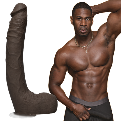 A shirtless Jax Slayher stares into the camera while grabbing the bulge in his boxer briefs. The Signature Cocks - Jax Slayher dildo is shown next to the porn star's body. | Kinkly Shop