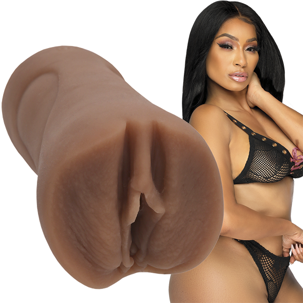 Karlie Redd is wearing lingerie and staring into the camera. The Signature Strokers Camgirls Karlie Redd stroker is shown next to the porn star. | Kinkly Shop