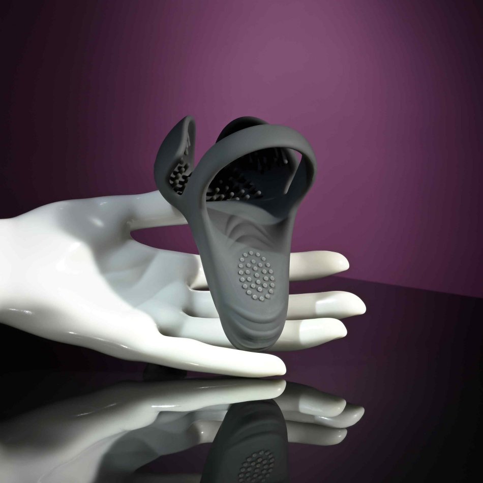 The Evolved Undercarriage is in the palm of a mannequin hand. It's slightly longer than the mannequin's palm, but it's not as long as the entire hand. | Kinkly Shop