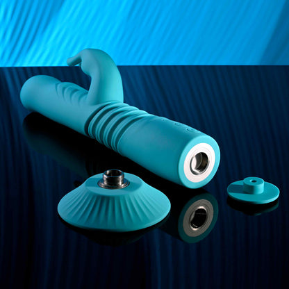 The Evolved Bunny Hop shown next to the suction cup base that can be screwed into the base of the vibe. This allows it to pleasure hands-free. | Kinkly